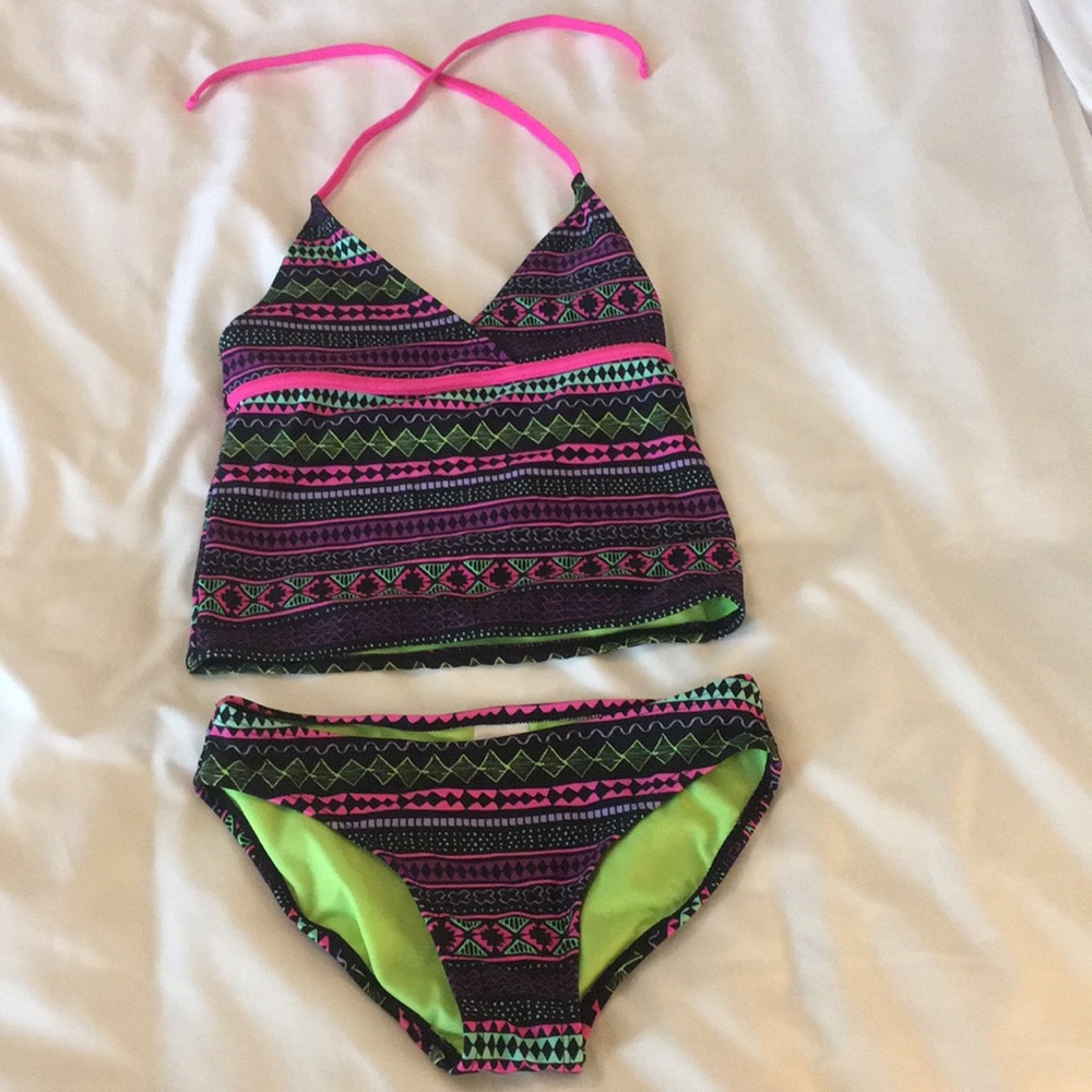 Girls Tankini, full of bright neon colors.